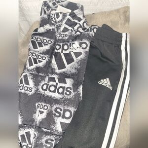 Adidas baby track suit. Size 12 months. Black and white graphic pattern.